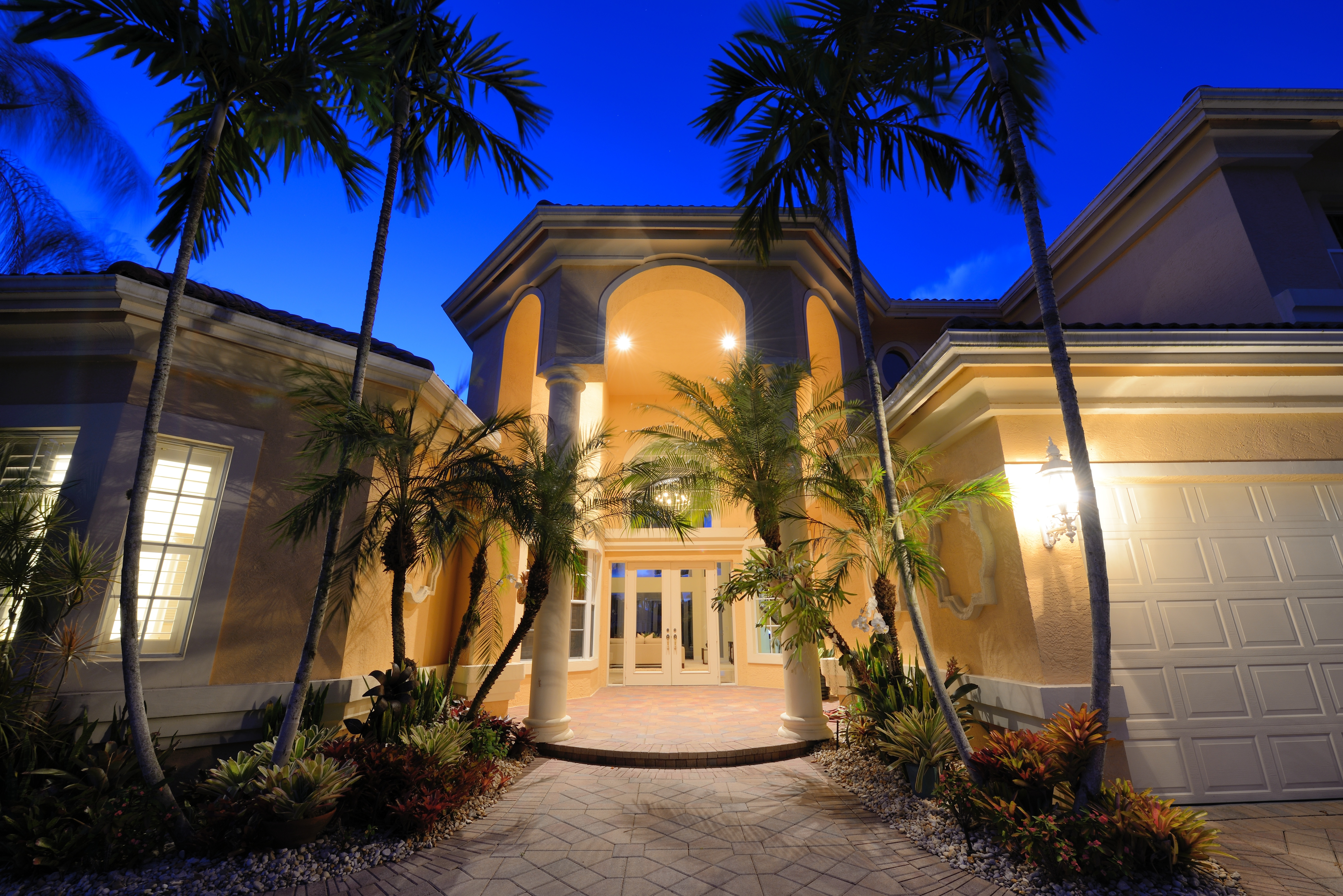 Mansion entrance in a tropical location.